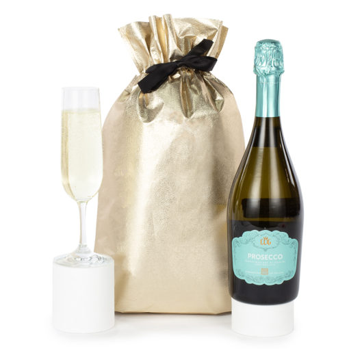 a bottle of Prosecco and a gold gift bag