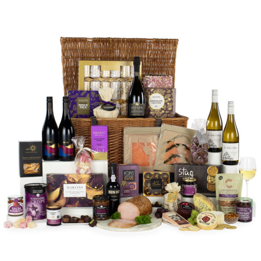 a luxury gift basket with a variety of snacks and drinks